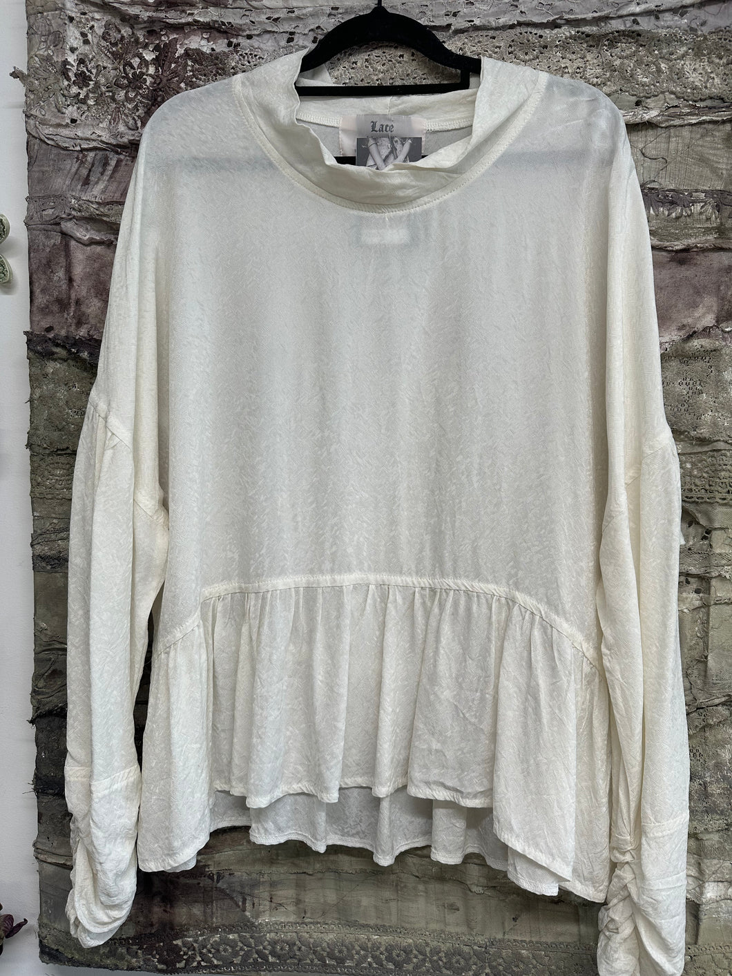 Cream rayon frill top