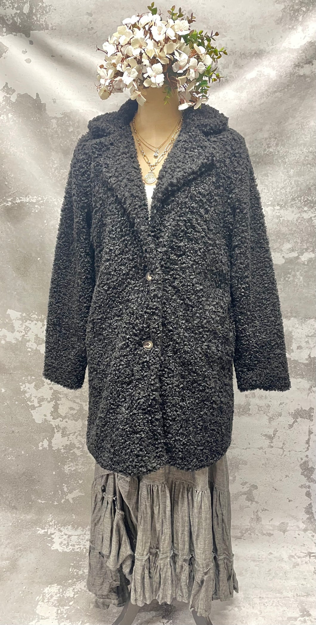 Black poodle coat